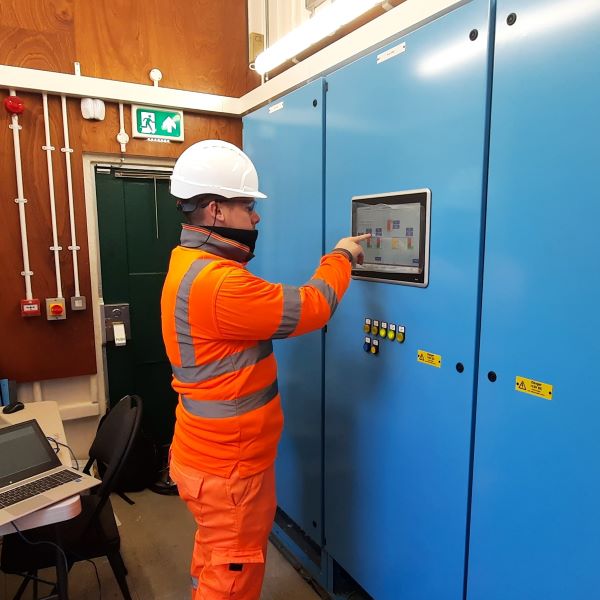 JV Engineer operating a Beijer X2Pro on a Low Voltage (LV) Control Panel where the ControlLogix PLC is located